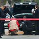 Los Angeles police investigate the scene of a shooting near 99th and Figueroa in South Los Angeles on Dec. 12, 2016.
Los Angeles Times screenshot